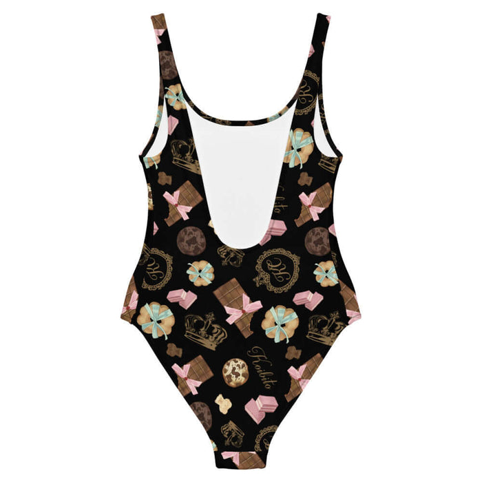 Royal Cookie kawaii one-piece swimsuit in vanilla cream with gilded monogram crests and pink bows