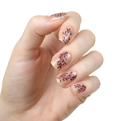 Beloved sheer nude nail polish with brown leaf accent nail art