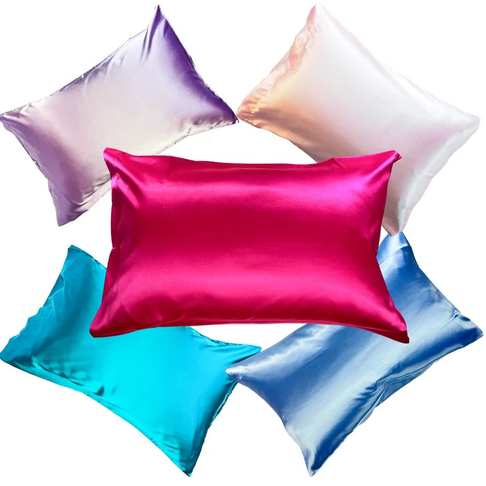 Set of colorful satin pillowcases on a white background