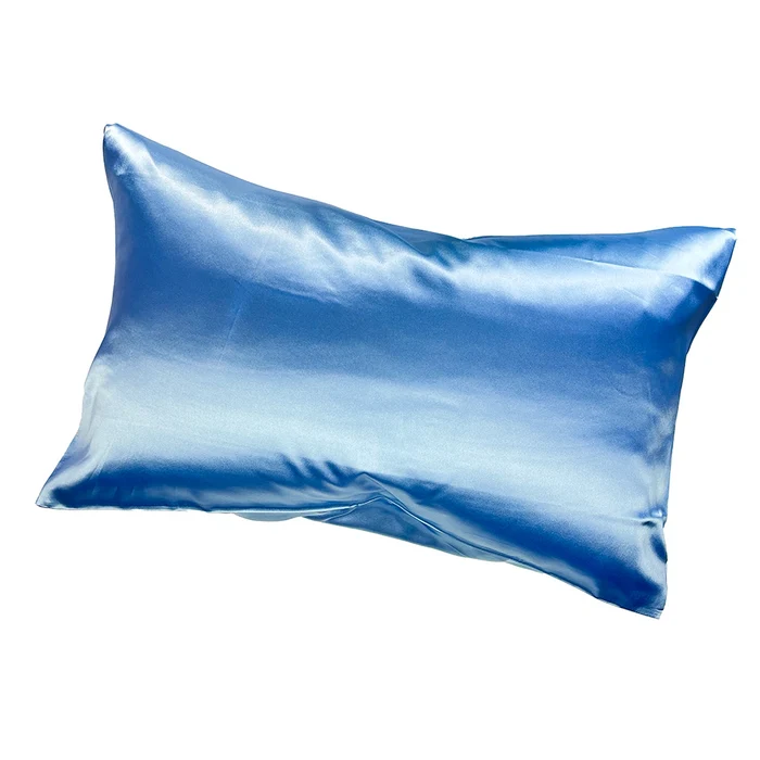 Blue satin pillow on a white background