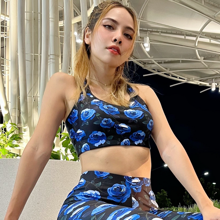 Enchanted Rose Sports Bra in black and blue with roses and briar stems, alternative activewear