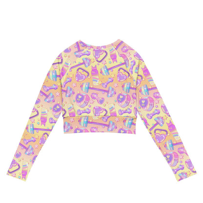 Glitter Gains kawaii long-sleeved crop top with pastel hearts and heart-shaped kettlebells, back view