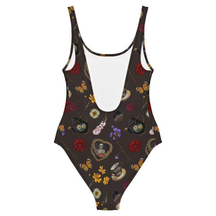 Gothic Tea Time one-piece swimsuit in black with white daisies and black teapots, kawaii goth style
