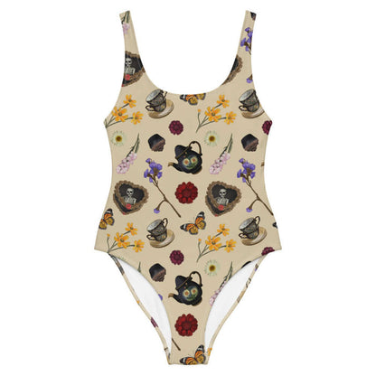 Gothic Tea Time one-piece swimsuit in black with red dahlias and stacked teacups, kawaii goth style