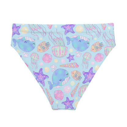 Under the Sea kawaii high-waisted bikini bottom in blue with blue narwhals and coral seashells