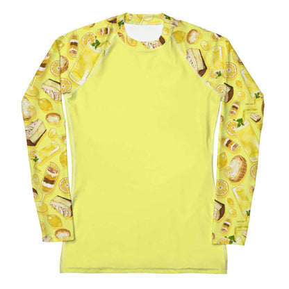 Lemon kawaii rash guard in yellow with a lemon meringue pie and glossy whole lemons