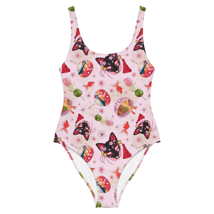 Matsuri kawaii one-piece swimsuit in pink with uchiwa fans and tricolor dango