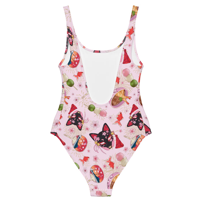 Matsuri kawaii one-piece swimsuit in pink with sakura-painted kitsune masks and goldfish