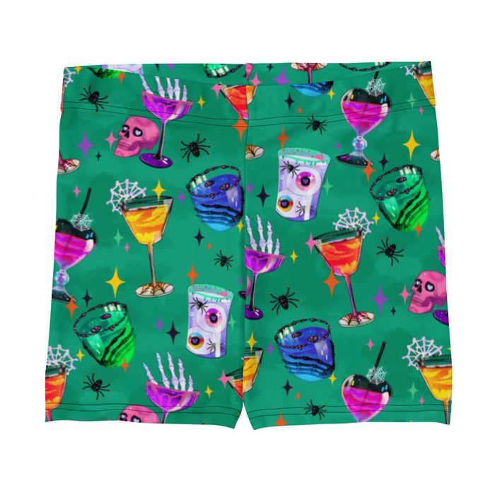 Monster Party gothic shorts, front view, with skeleton hands and glossy candy apples in jewel tones
