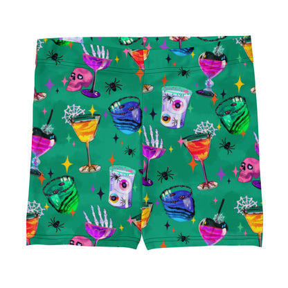 Monster Party gothic shorts, front view, with skeleton hands and glossy candy apples in jewel tones