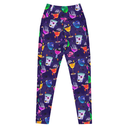 Monster Party alternative premium pocket leggings, back view, with cobwebbed candy apples and retro sparkles in jewel tones
