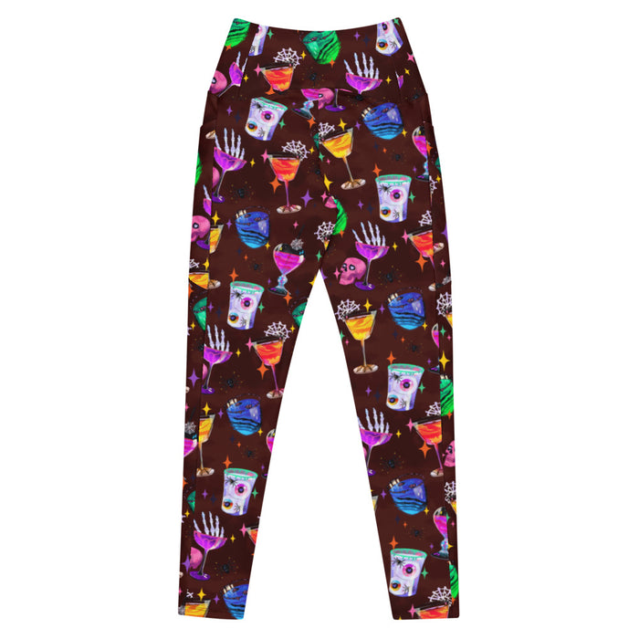 Monster Party alternative premium pocket leggings, back view, with retro sparkles and eyeball drinks in jewel tones