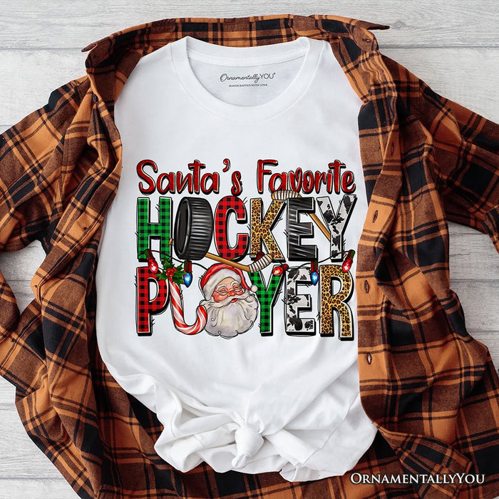 Santa’s Favorite Hockey Player Plaid Christmas T-Shirt, Sports Team Holiday Tee T-Shirts OrnamentallyYou White XS