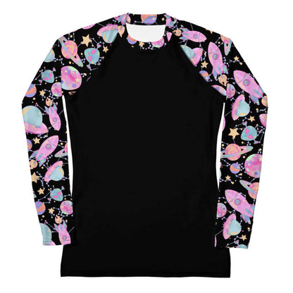 Space kawaii rash guard in lavender with rainbow-swirled planets and glowing orbs