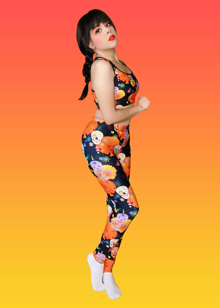 Sugar Skull kawaii leggings with ornate skulls and line-art daisies on black